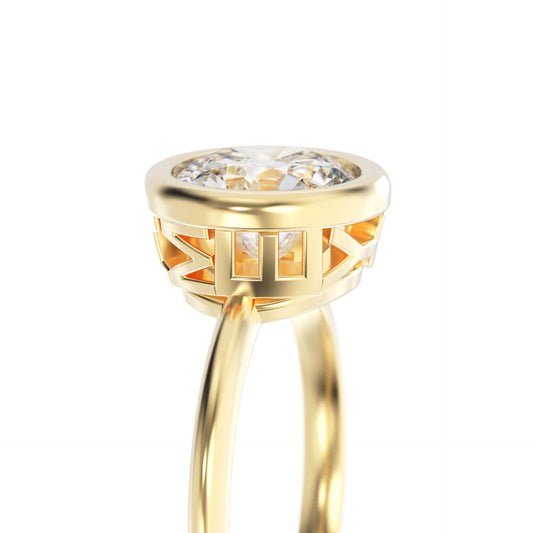Gold ring with a clear gemstone on a white background