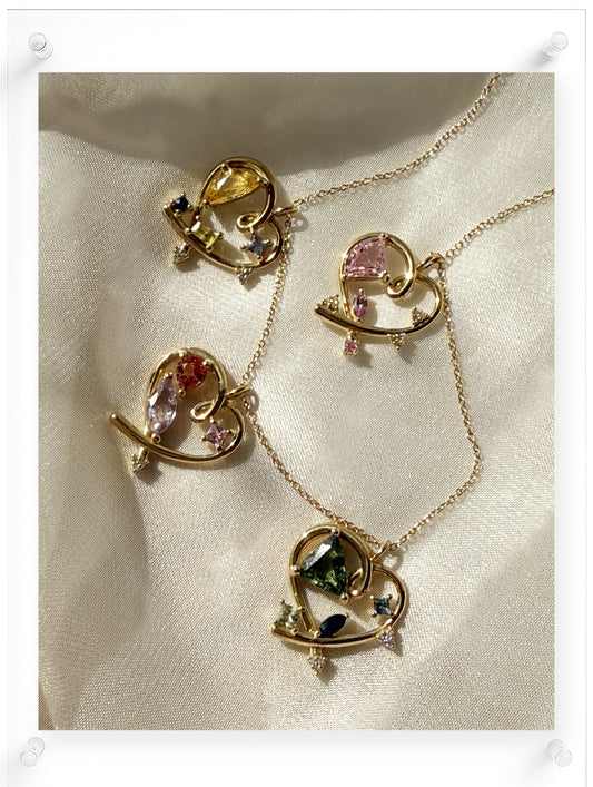 Contemporary Gold Heart Necklace with Natural Pink Sapphires