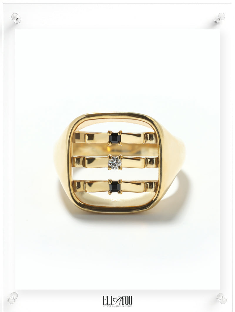 Front image of signet 10k gold ring featuring ribbon shape with black and white diamond