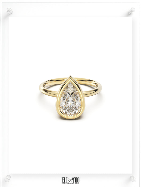 Front view of Pear Cut Diamond Ring with bezel setting featuring initials on the side