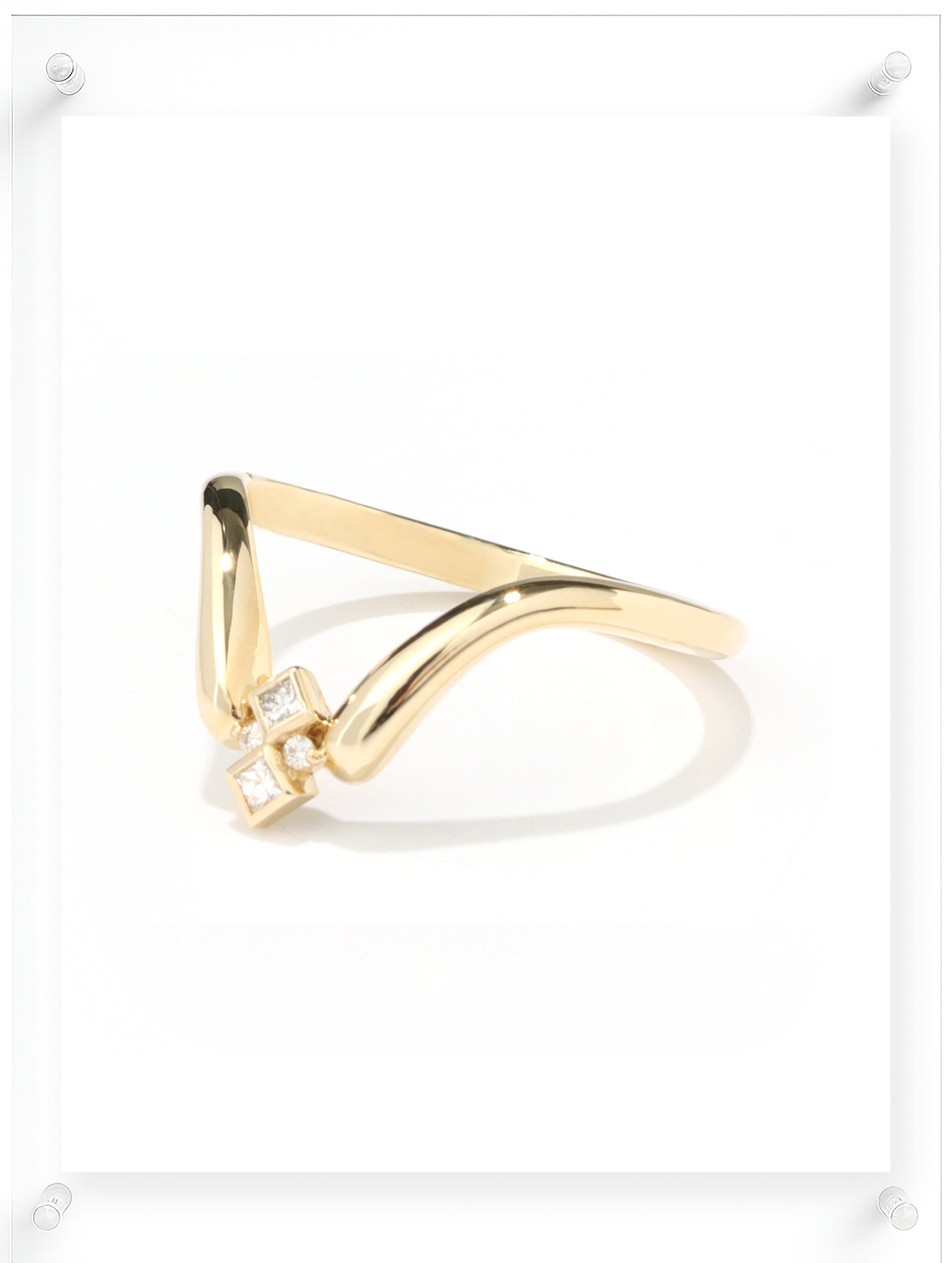 Contemporary yellow gold open ring with geometric diamond accents, side view