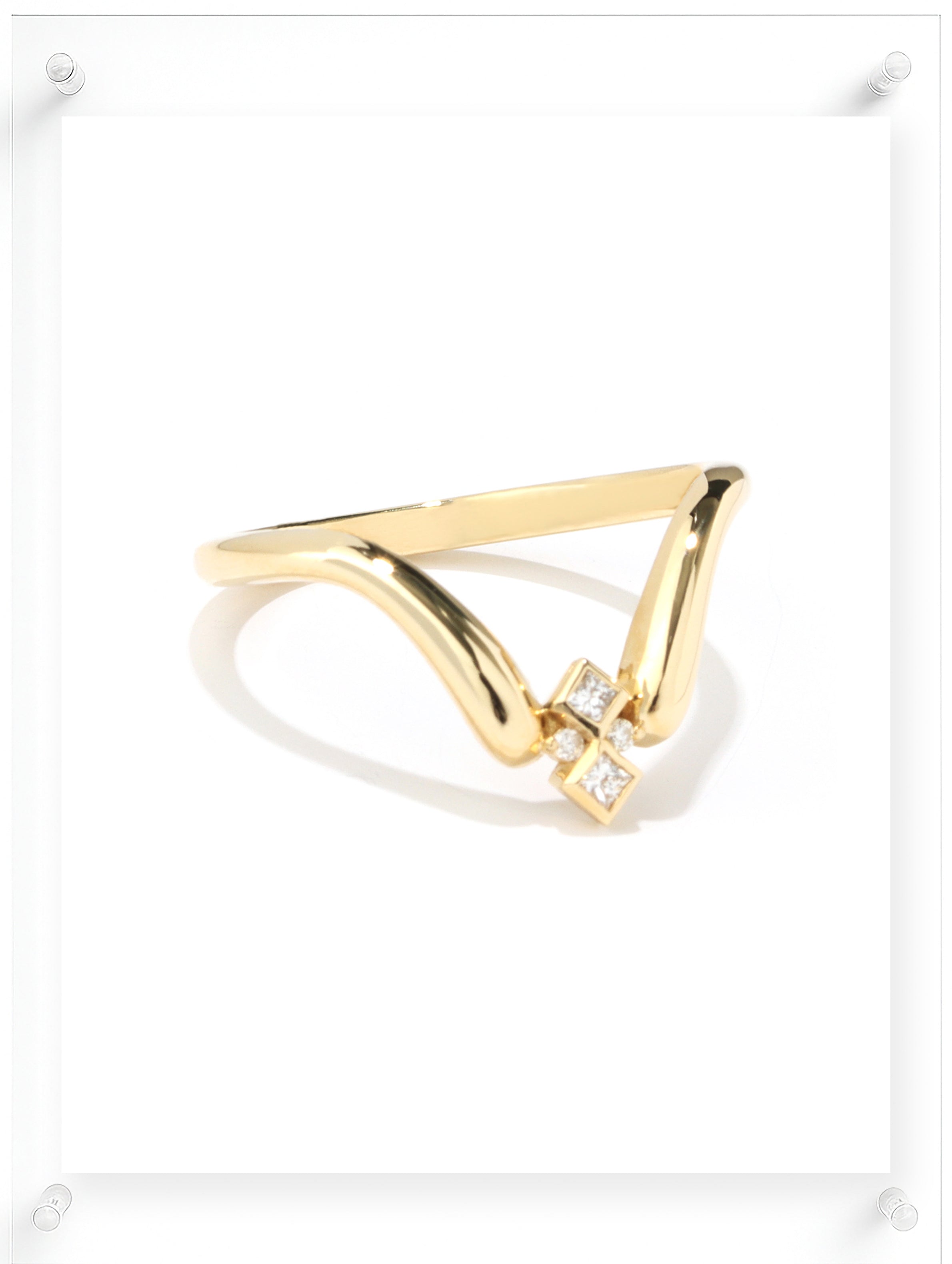 Contemporary yellow gold open ring with geometric diamond accents, side view