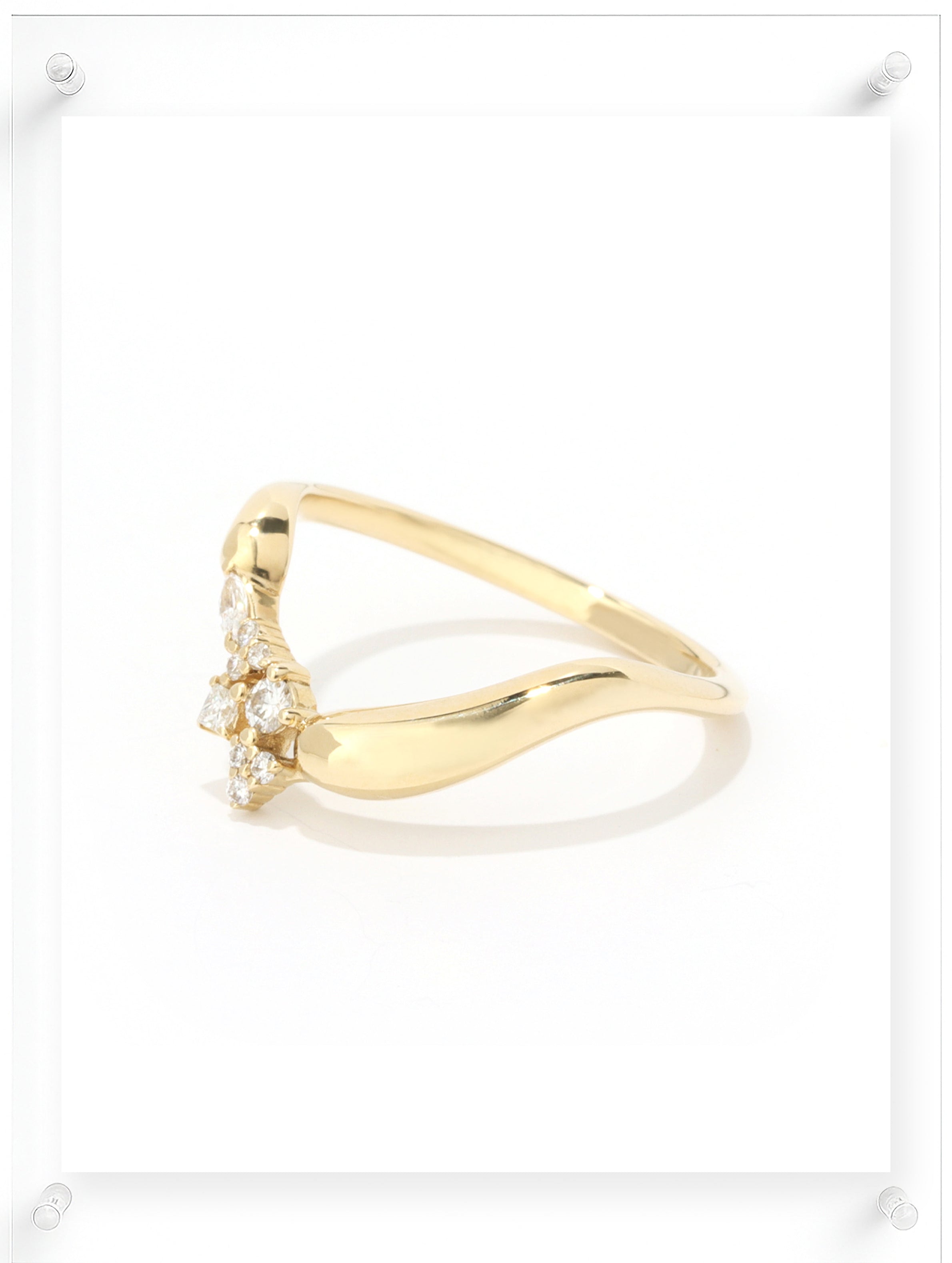 Contemporary yellow gold open ring with clustered diamond accents, side view
