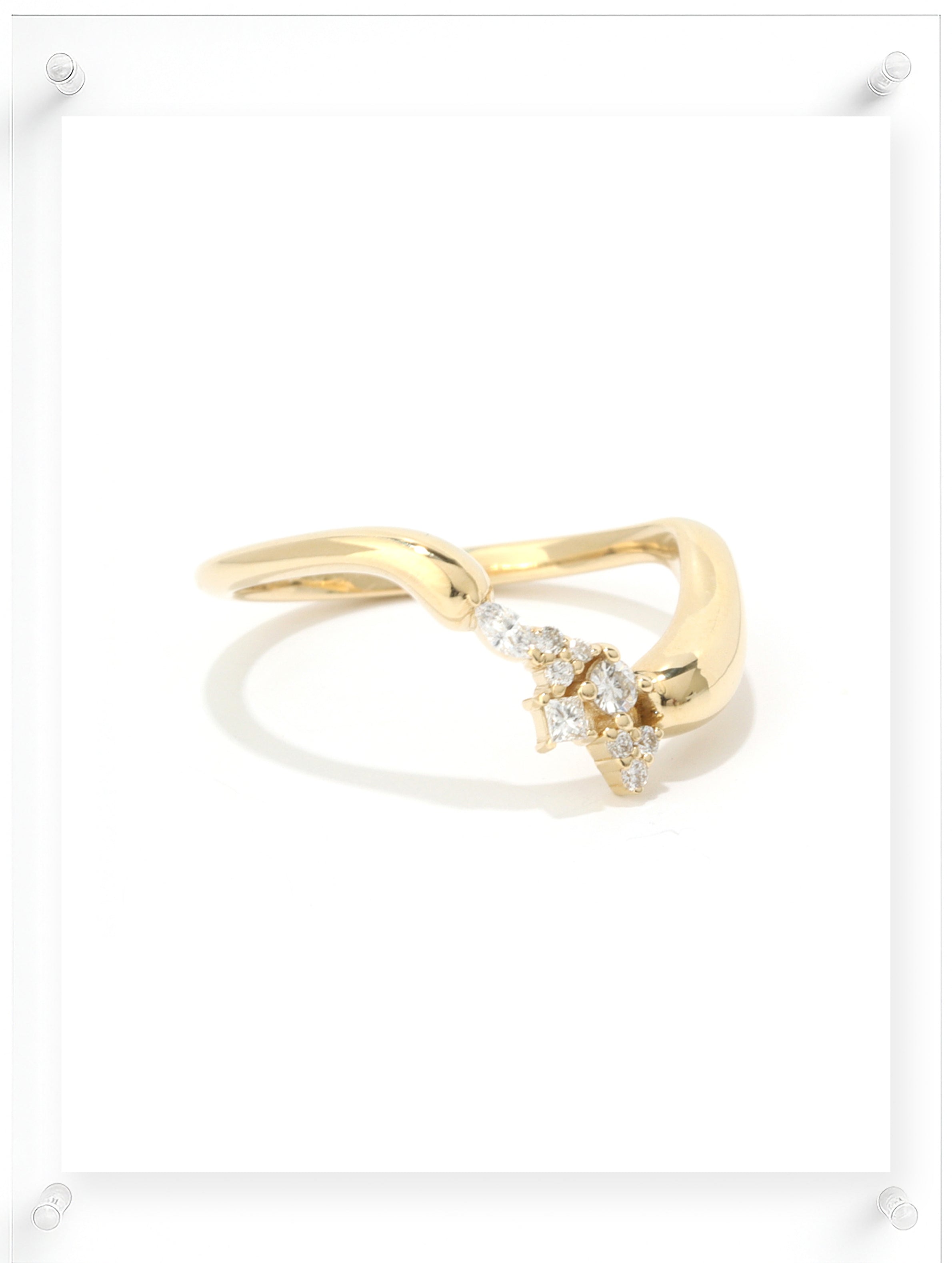 Contemporary yellow gold open ring with clustered diamond accents, side view