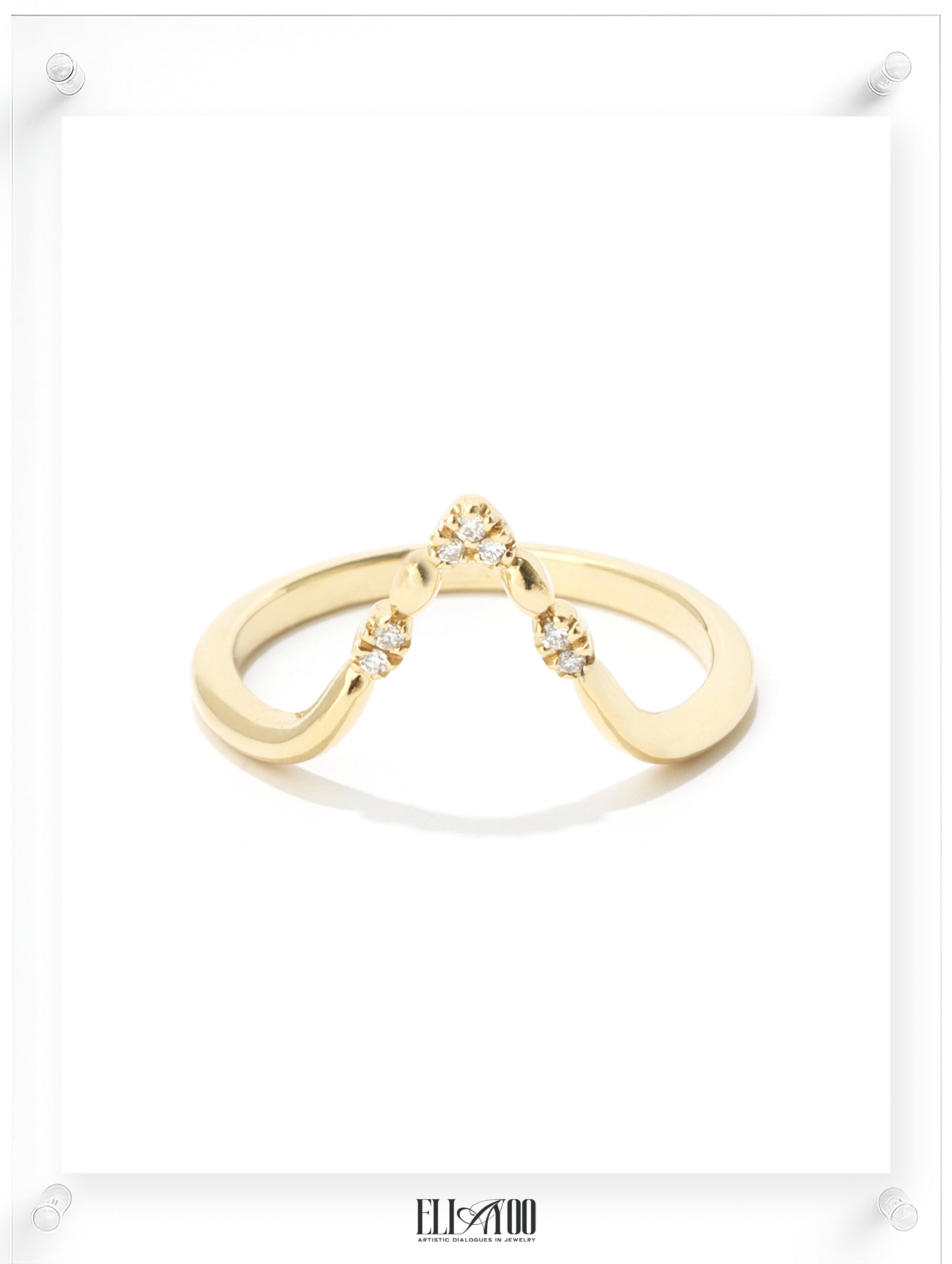 Contemporary yellow gold open ring with diamond accents, front view