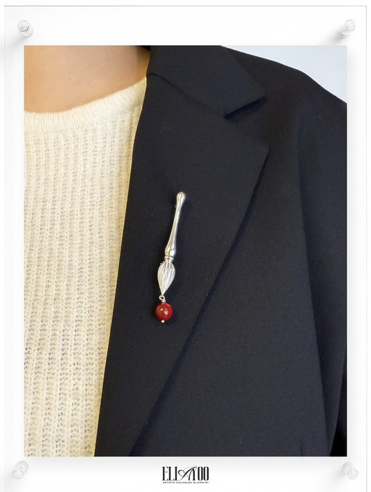 Model view of Silver brooch featuring a paint brush shape with a CoralSphere