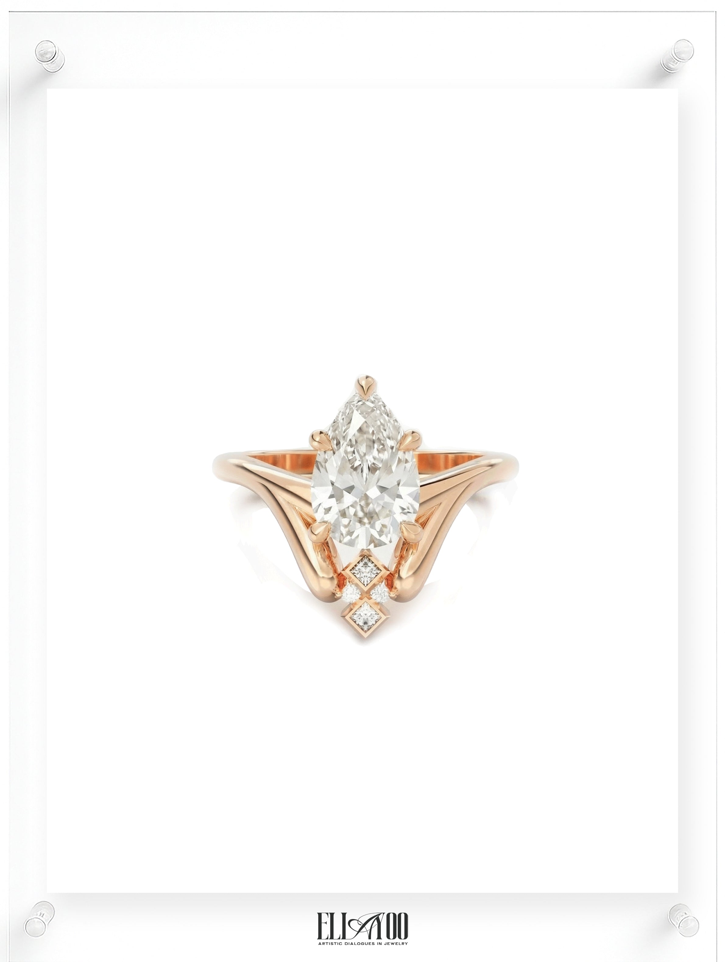 Front Front shot of 14k Rose Gold Pear cut Diamond Ring with guard stone detail