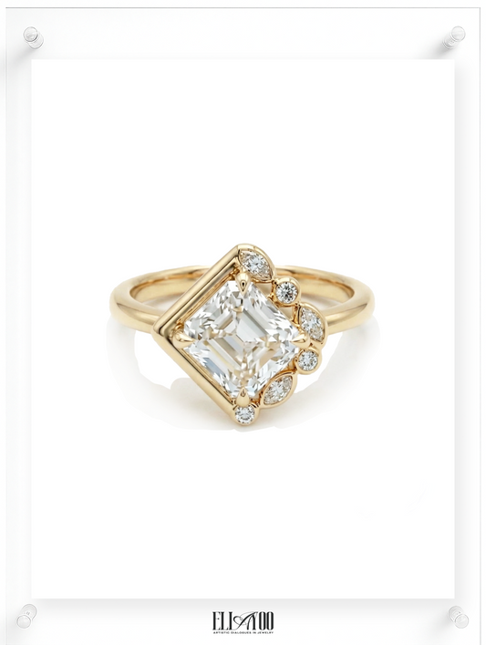 Contemporary yellow gold ring with emerald-cut diamond and pavé diamond accents, front view
