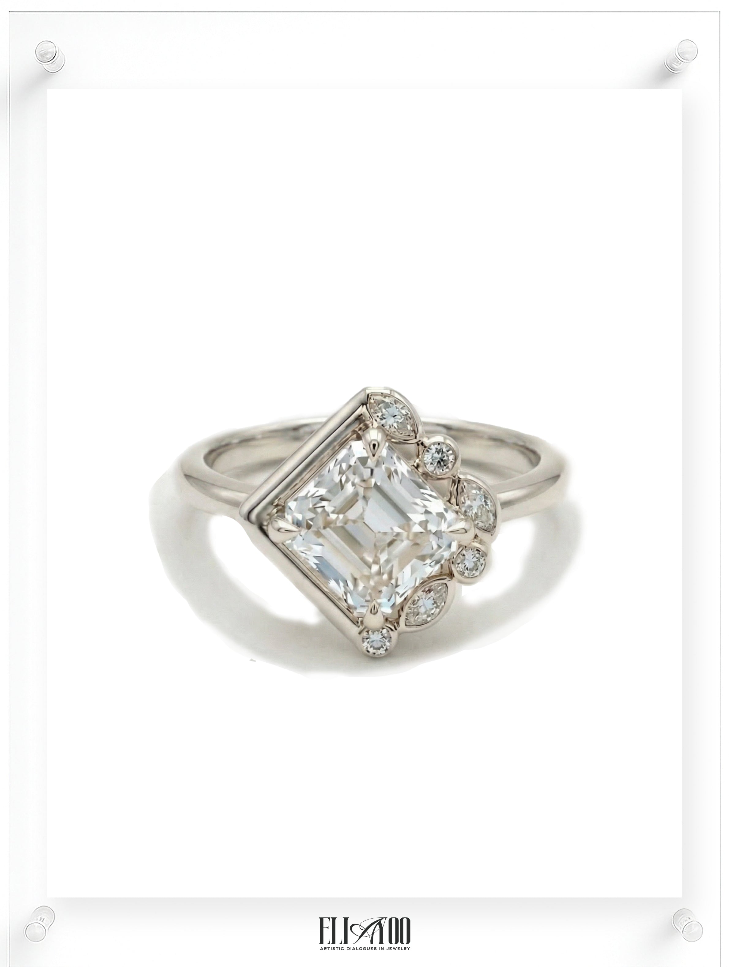 Contemporary White gold ring with emerald-cut diamond and pavé diamond accents, front view