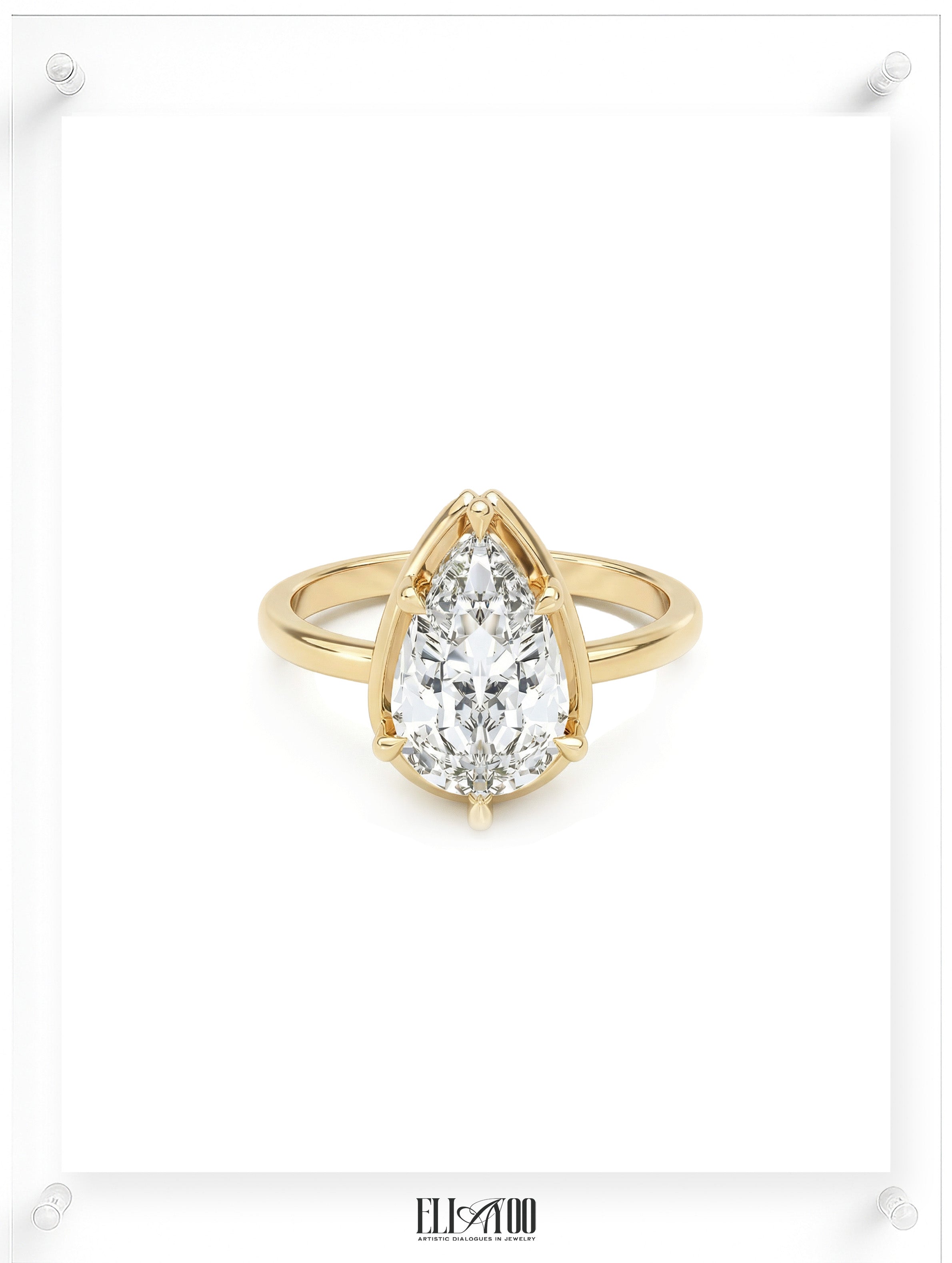 Front view of Pear cut diamond yellow gold ring