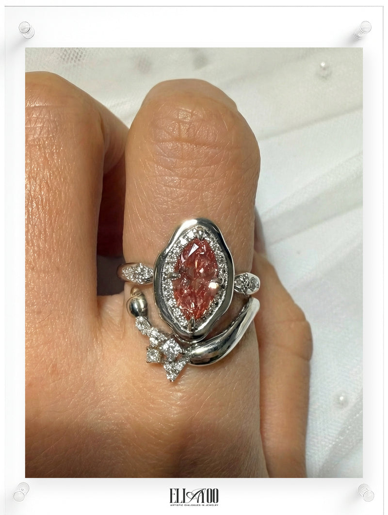 model shot of 14k White Gold ring with a pink diamond on a white background