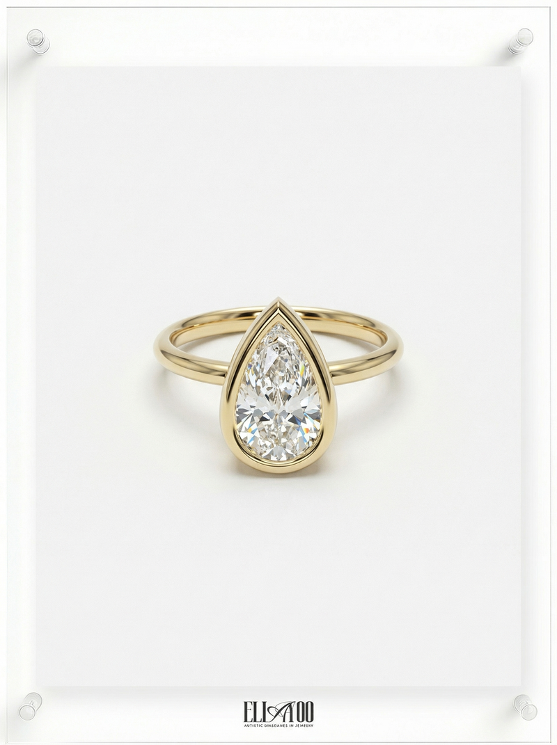 Front view of Pear Cut Diamond Ring with bezel setting featuring initials on the side