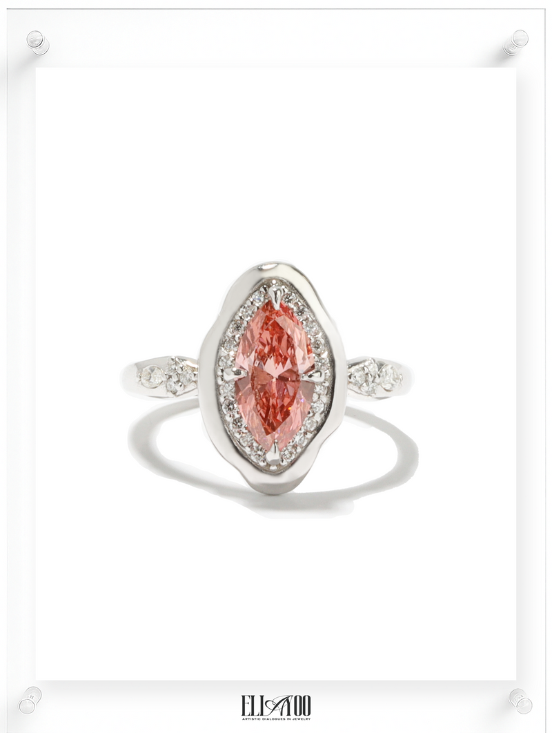 14k White Gold ring with a pink diamond on a white background