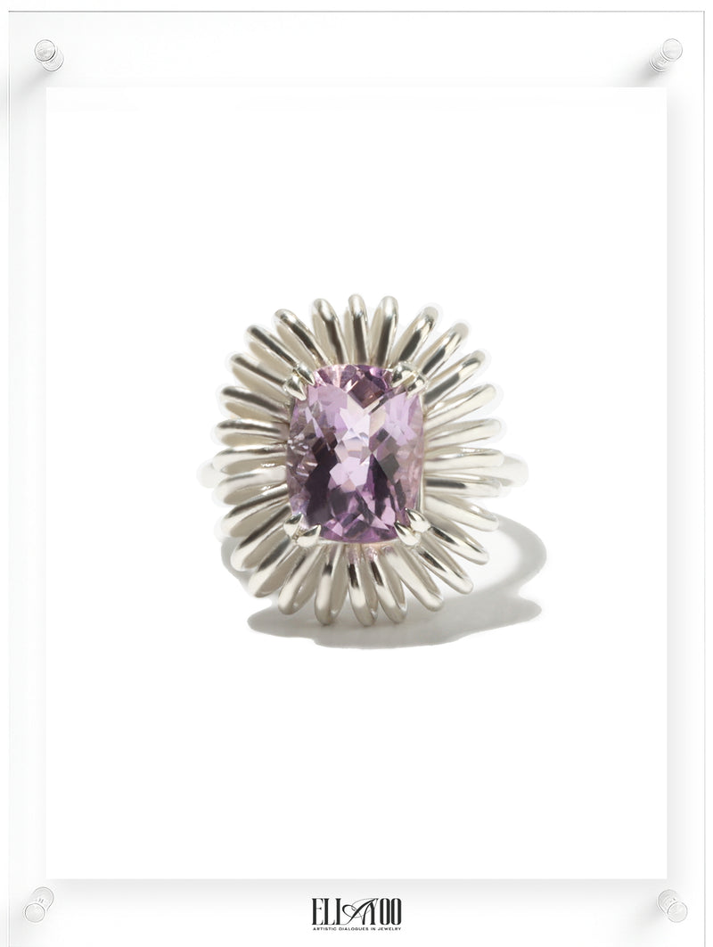 Elongated Cushion cut Amethyst ring with sculptural silver petal setting, contemporary art-inspired design