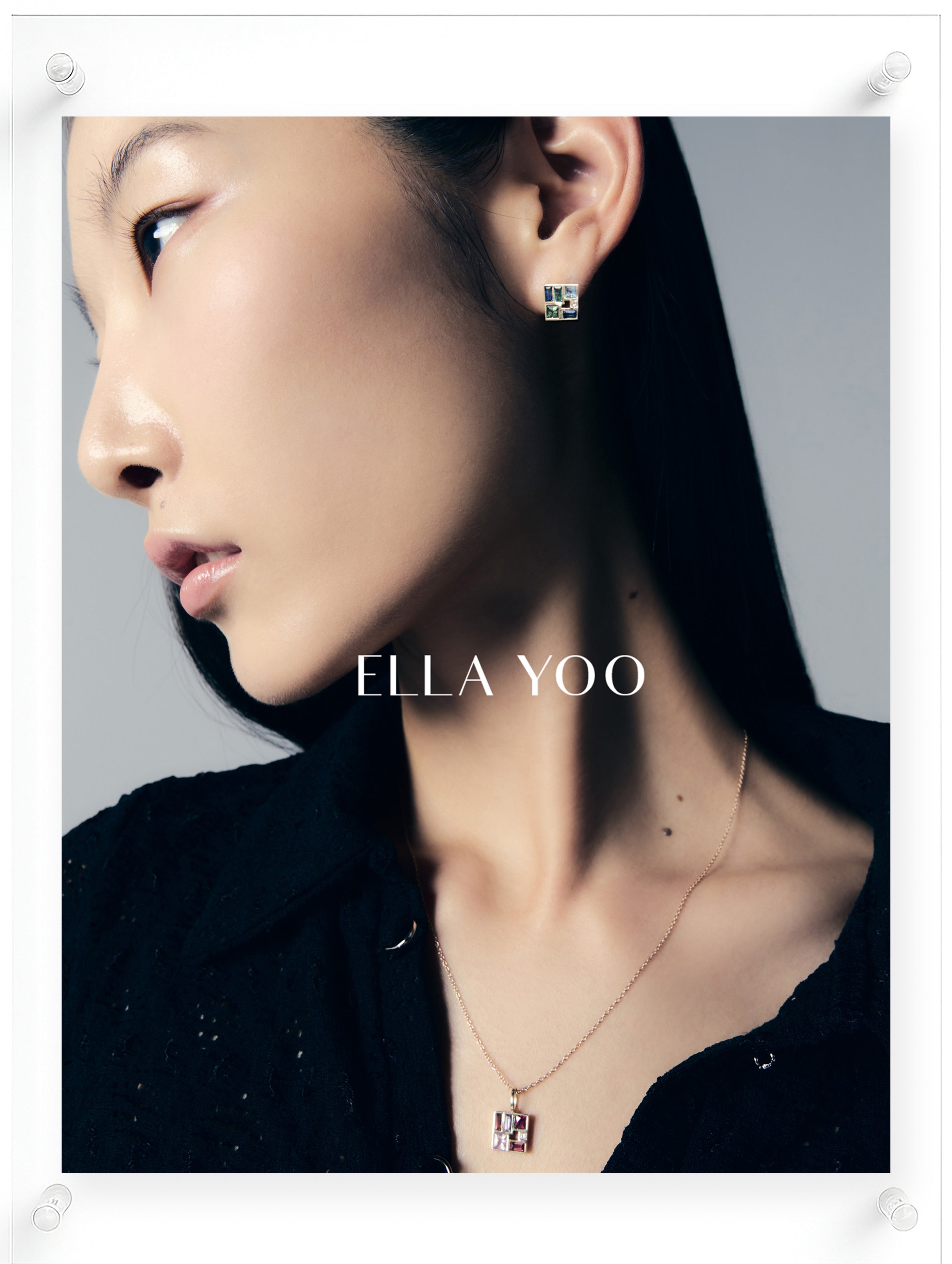 Model wearing 14K yellow gold geometric gemstone stud earrings and matching pendant necklace with pink tourmaline and diamond, contemporary fine jewelry by Ella Yoo